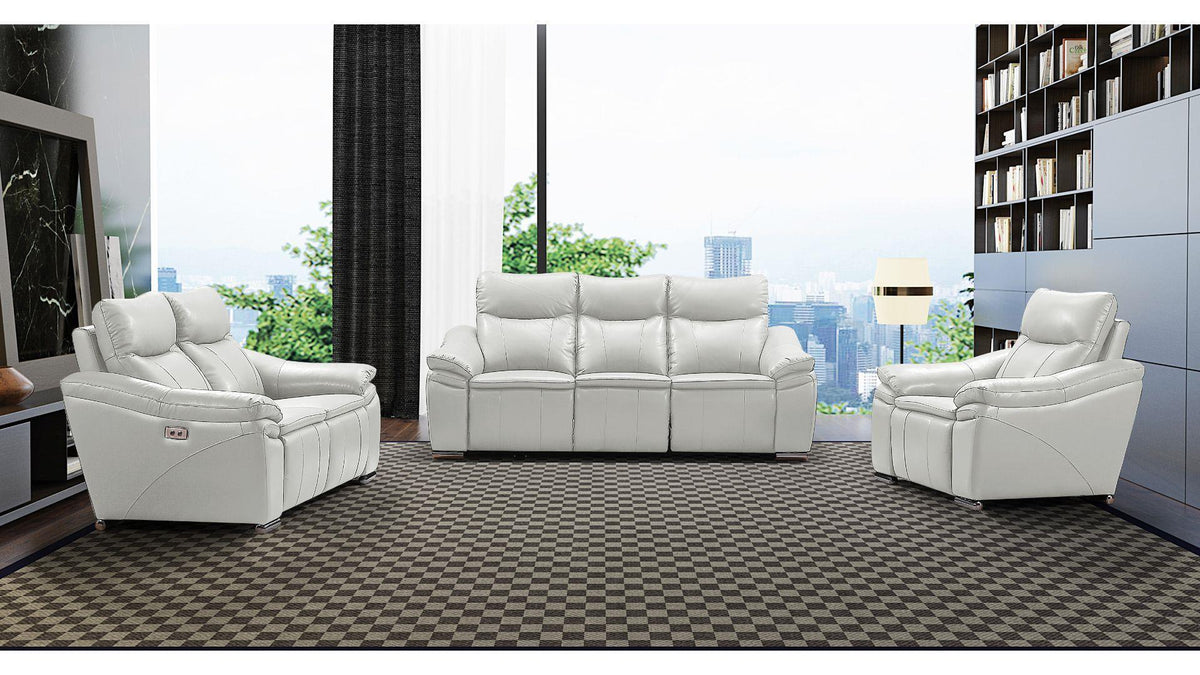White leather sofa set in a modern living room with cityscape view