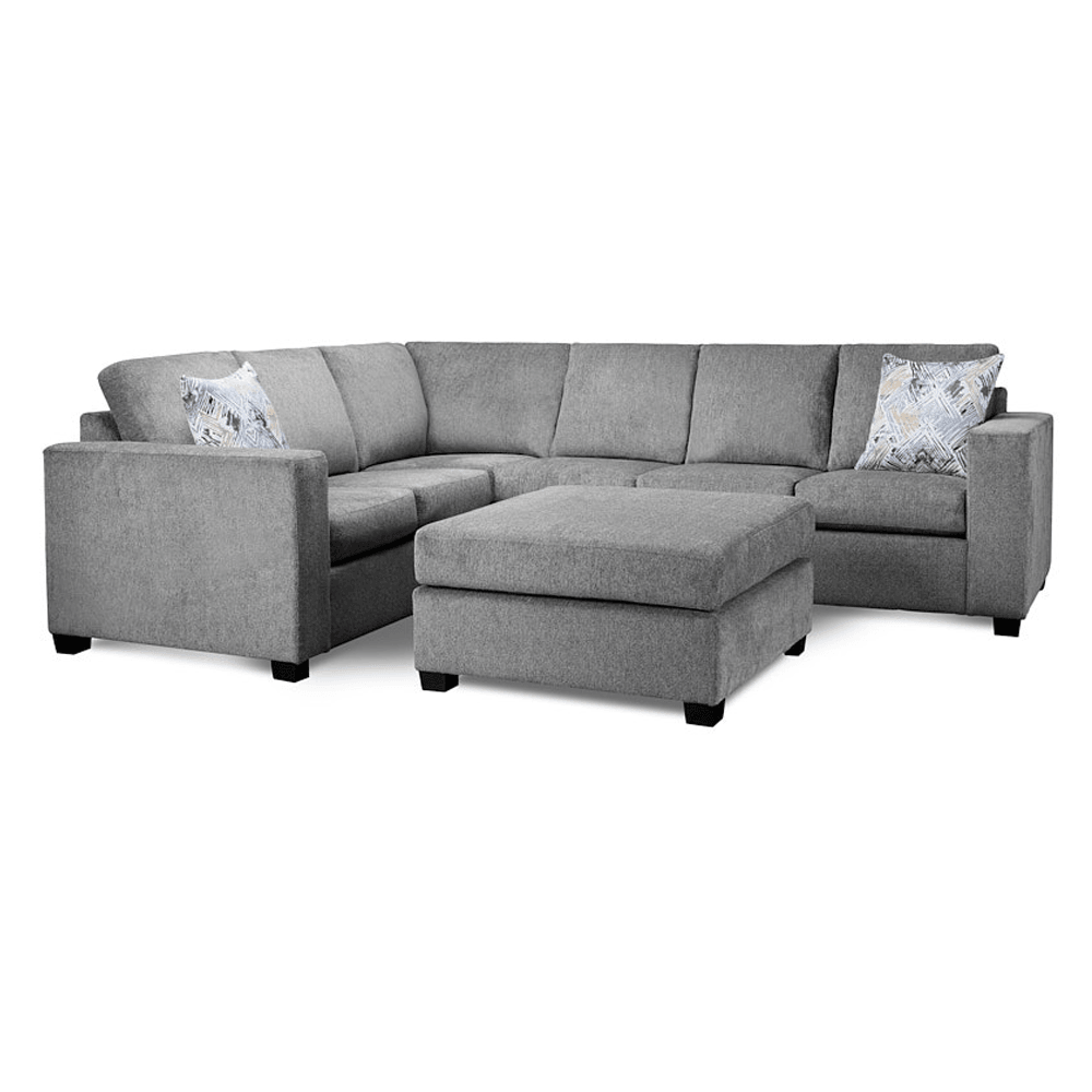 Gray sectional sofa with patterned cushions on a white background